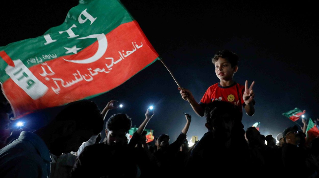 a child waves a pti flag and gestures during a rally in support of former prime minister imran khan in islamabad on april 10 reuters