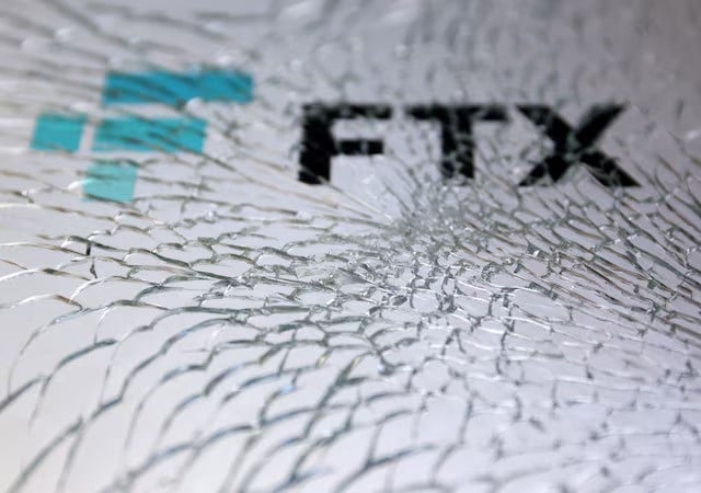 an ftx logo is seen through broken glass in this illustration taken december 13 2022 photo reuters