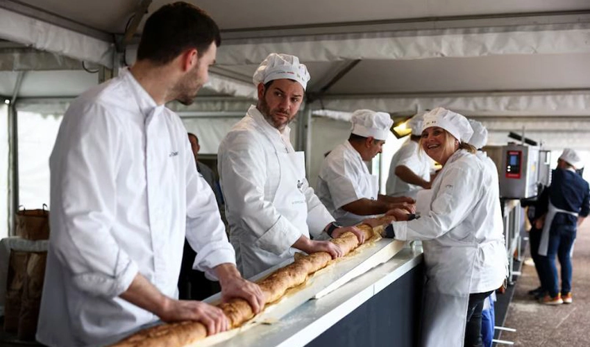 French bakers make world's longest baguette, beating Italy