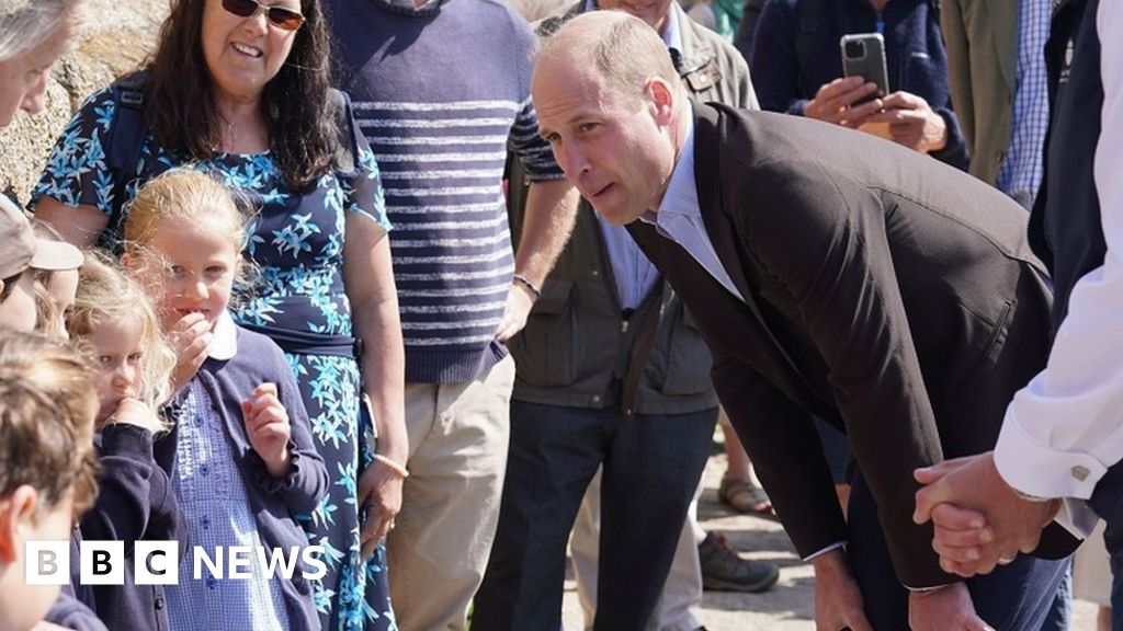 Prince William during a visit to Fistrall Beach in Newquay